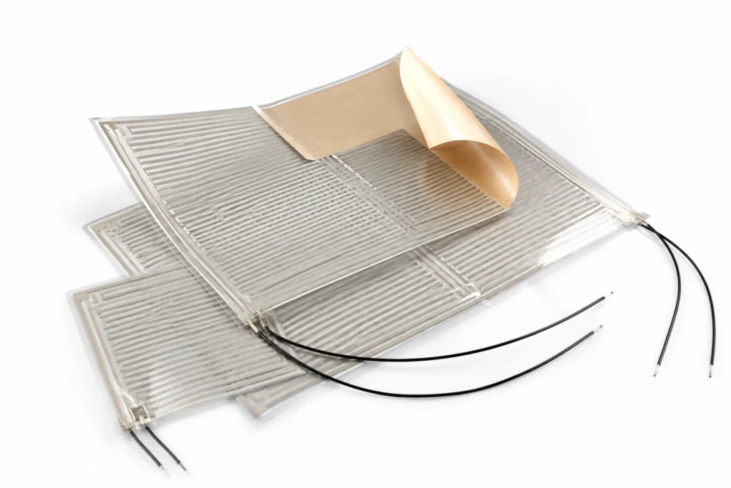 Mirror and Glass Demisting Heaters — the construction this page describes